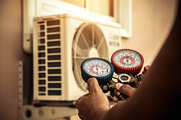 Professional Heat Pump Repair technician working in Big Lake, WA
